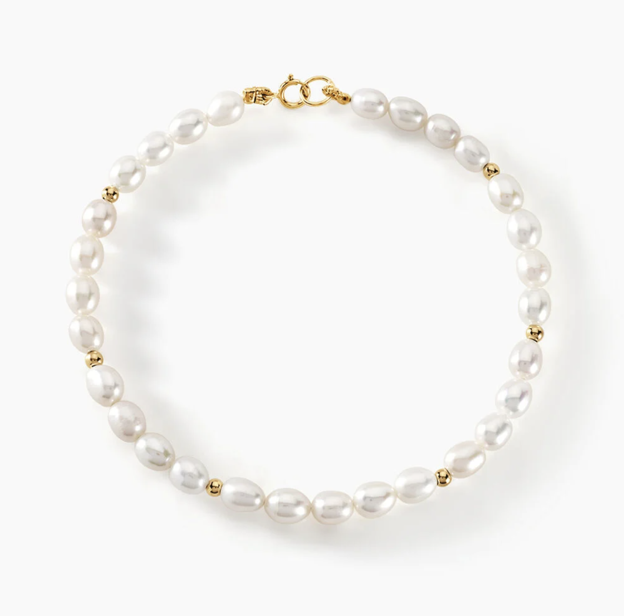 Collier perles blanches et dorées.